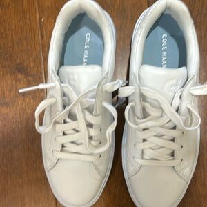 Cole Haan white  tennis shoes worn 1 time.